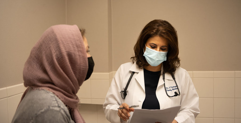 Dr. Farizani and female patient